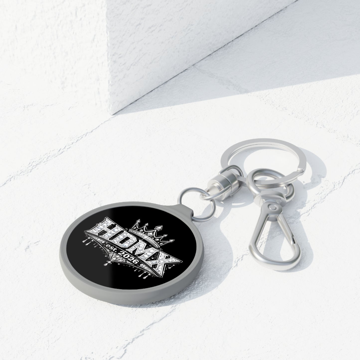 HDMX Crown Keyring Tag — Metal Keychain with 'HDMX est. 2026' Graphic
