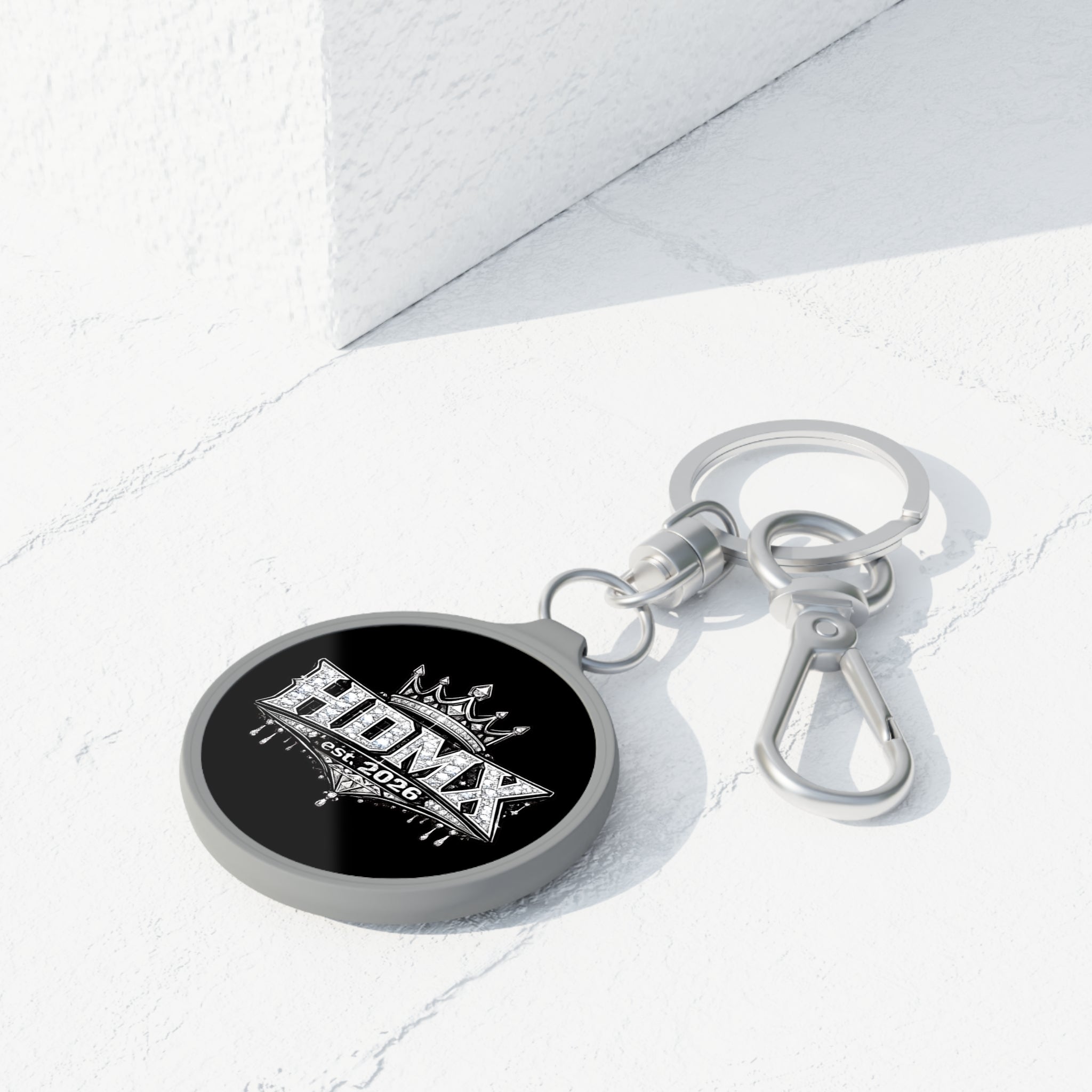 HDMX Crown Keyring Tag — Metal Keychain with 'HDMX est. 2026' Graphic