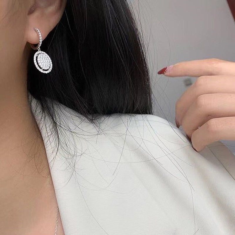 White Gold Oval Earrings - Stylish Elegance for Every Occasion